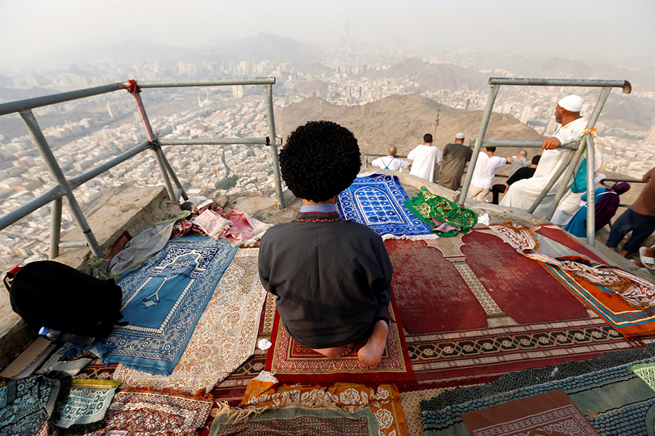A Muslim pilgrim prays at Mount Al-Noor ahead of the annual haj pilgrimage in the holy city of Mecca
